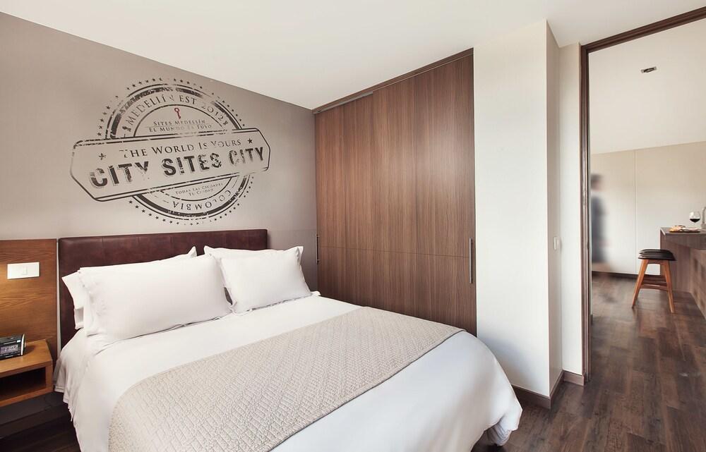 Sites Hotel Медельин Экстерьер фото A bedroom in a typical apartment