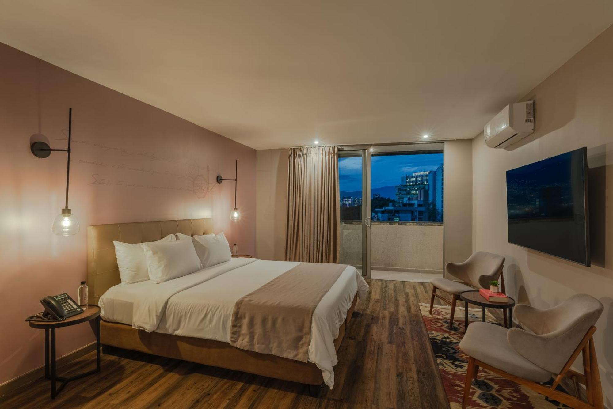Sites Hotel Медельин Экстерьер фото A bedroom at the hotel
