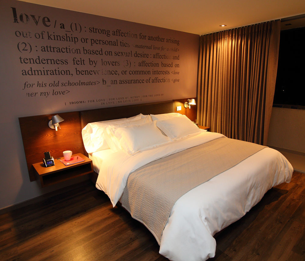 Sites Hotel Медельин Экстерьер фото A bedroom at the hotel